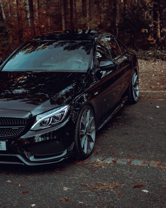 a black car parked on the side of the road, pexels contest winner, purism, mercedez benz, thumbnail, modified, profile image