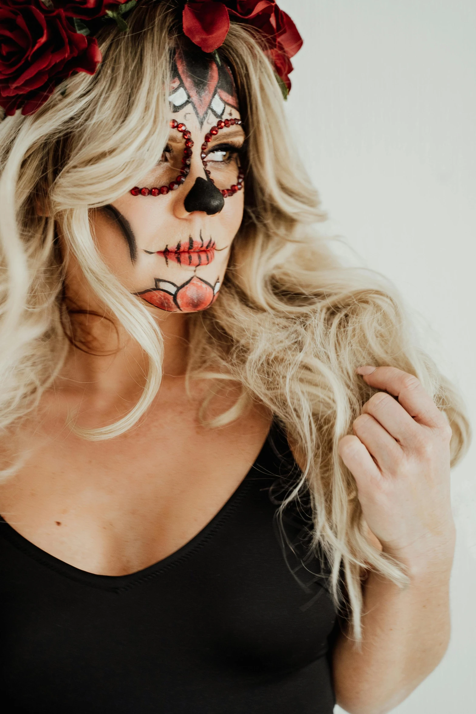 a woman with a flower crown on her head, trending on pexels, lowbrow, skeletal with extra flesh, close up of a blonde woman, body painted with black fluid, with a white background