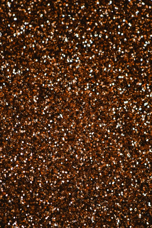 a close up of a brown glitter background, an album cover, reddit, dark orange, detailed product image, high quality material bssrdf, my pov