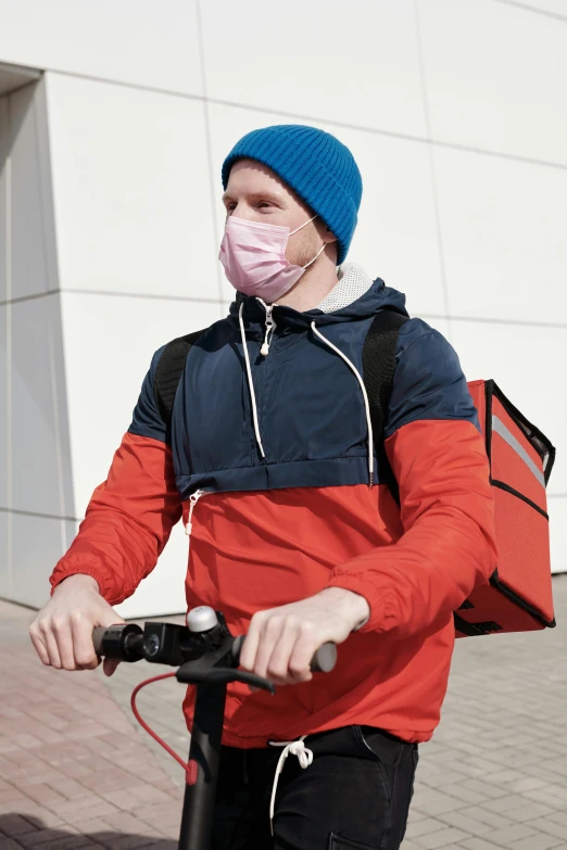 a man wearing a face mask riding a scooter, carrying survival gear, square, red, 7