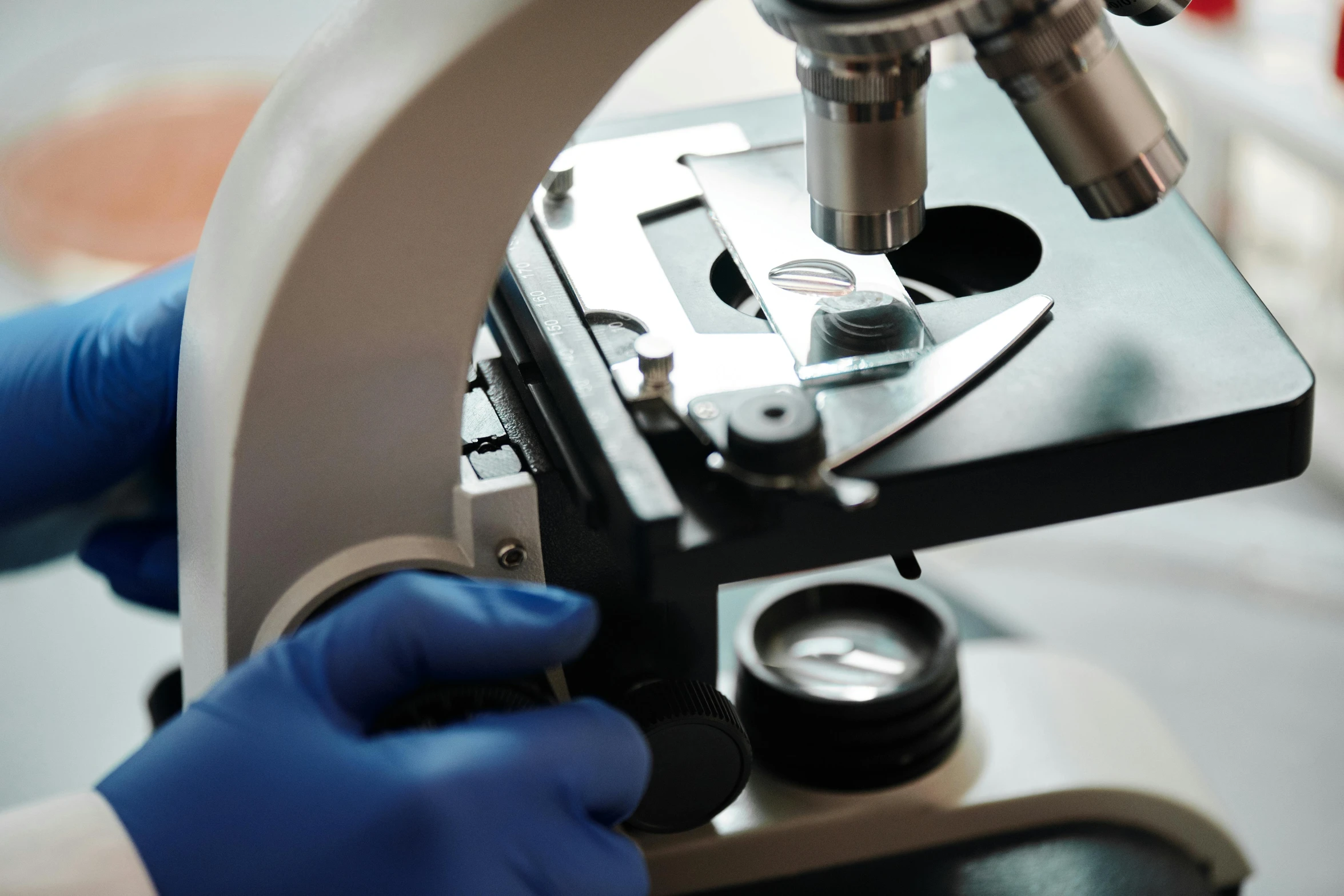 a close up of a person using a microscope, medical supplies, fan favorite, pathology, thumbnail