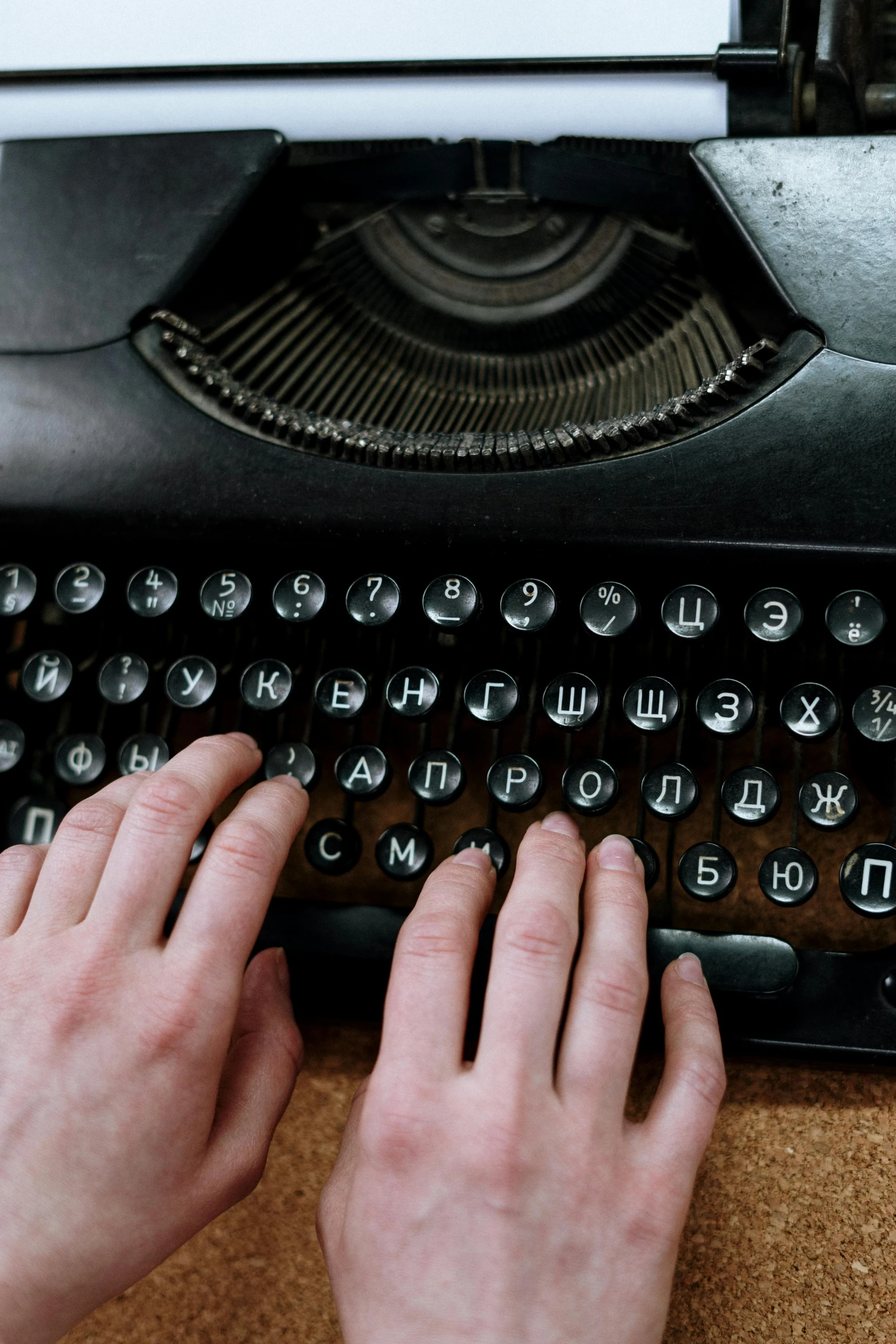 a person typing on an old fashioned typewriter, inspired by Władysław Malecki, 000 — википедия, teaser, panel, production photo