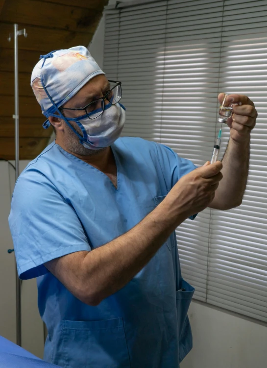 a close up of a person in a hospital room, reddit, figuration libre, holding syringe, navid negahban, surgery theatre, profile image