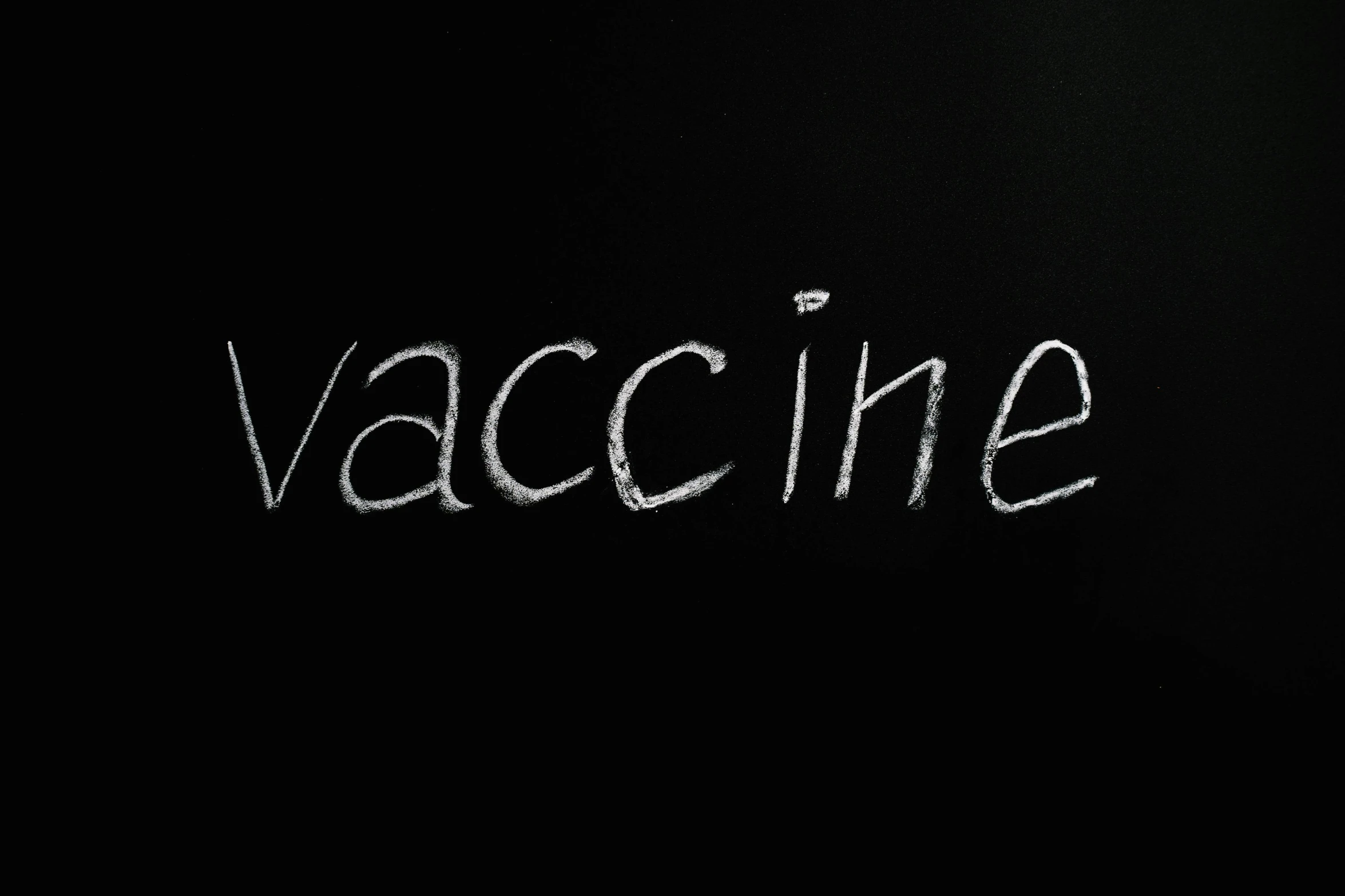 the word vaccine written in white chalk on a blackboard, an album cover, pixabay, medical machinery, front facing shot, skin, black