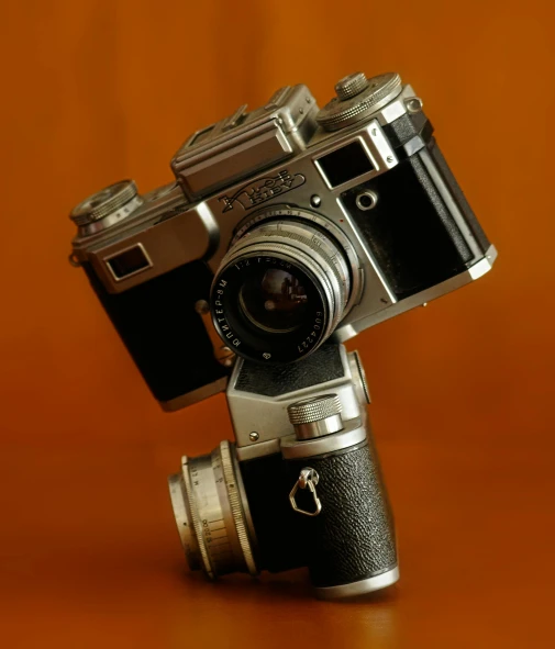 a close up of a camera on a table, by Sven Erixson, various posed, soviet - era, high-quality photo, 8k ”