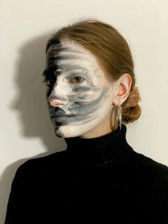a woman with white paint on her face, an album cover, reddit, black and grey, photo taken in 2 0 2 0, multilayered paint, profile image