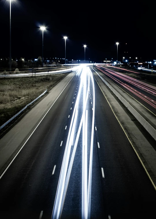 a long exposure photo of a highway at night, by Dan Scott, unsplash, ilustration, high speed camera, in 2 0 1 2, thumbnail