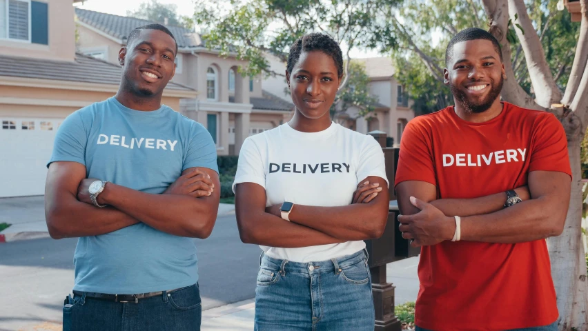 three people standing next to each other in front of a house, logo for lunch delivery, mkbhd, wearing shirts, profile image