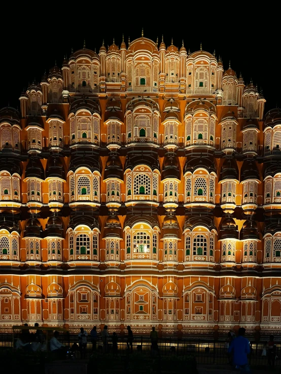 a large building that is lit up at night, inspired by Steve McCurry, renaissance, of indian princess, fan favorite, movie photo, square