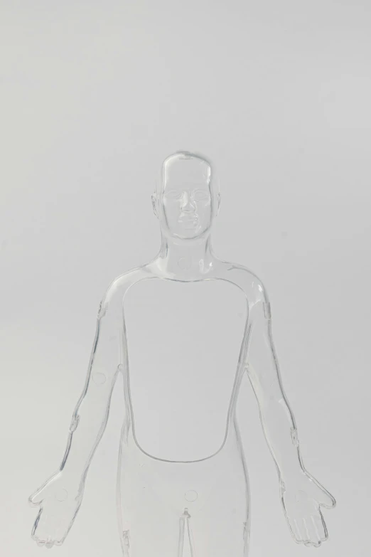 a man standing in front of a white background, a raytraced image, unsplash, conceptual art, made out of clear plastic, slender symmetrical body, 2 0 0 1, tabletop model