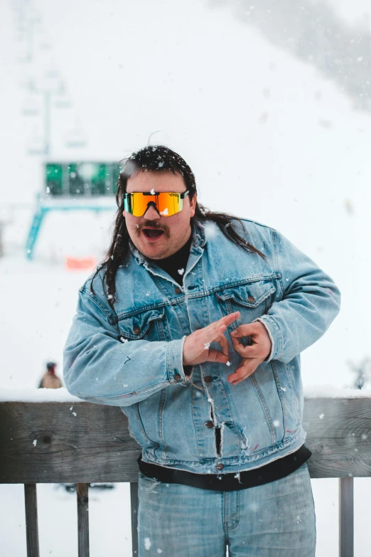 a man standing on top of a snow covered slope, an album cover, inspired by Karl Gerstner, trending on reddit, graffiti, wearing oakley sunglasses, aboriginal australian hipster, thicc, photo of genghis khan