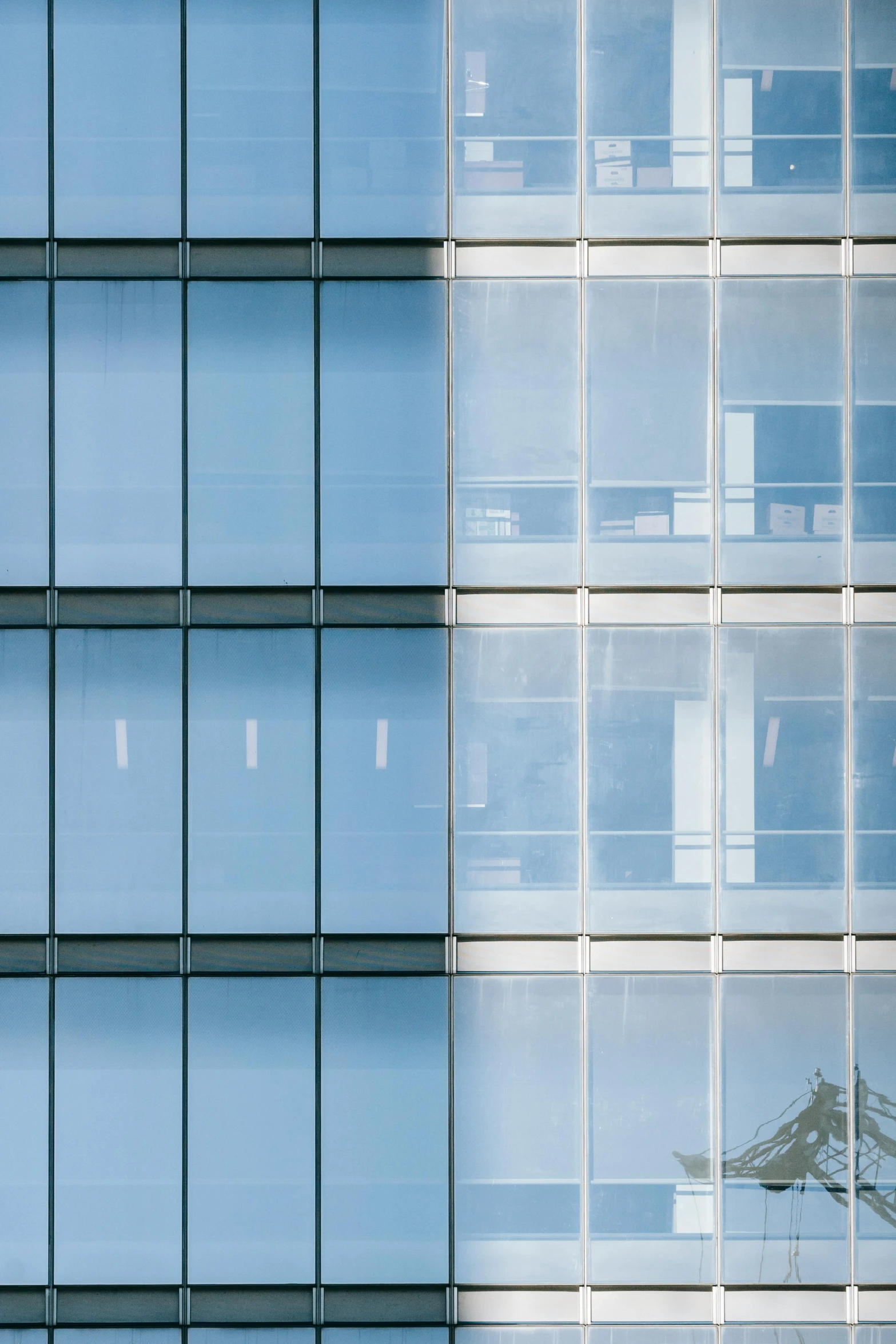 a plane that is flying in front of a building, inspired by David Chipperfield, modernism, gradient light blue, window glass reflecting, hoog detail, slide show