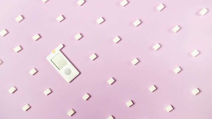a white ipod sitting on top of a pink surface, inspired by Malevich, trending on pexels, minimalism, milk cubes, purple checkerboard, switches, sweets