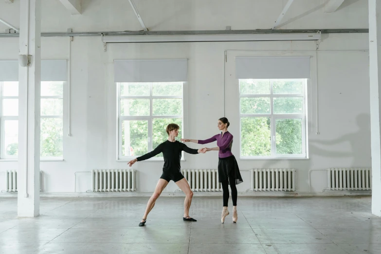 a couple of women standing next to each other in a room, by Elizabeth Polunin, unsplash, arabesque, ivan shishkin and greg rutkowski, school class, empty background, couple dancing