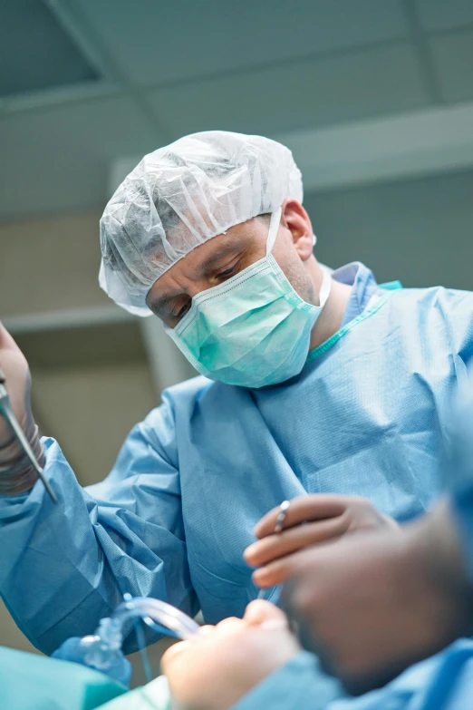 a group of surgeons performing surgery on a patient, by Adam Marczyński, shutterstock, multiple stories, 2717433015, banner, surgical supplies