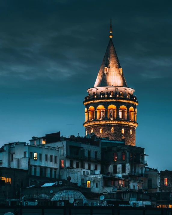 a tall tower sitting in the middle of a city, pexels contest winner, art nouveau, turkish and russian, lgbtq, moody night time scene, product image