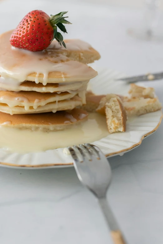 a stack of pancakes with syrup and a strawberry on top, silver，ivory, thumbnail, light orange mist, made of glazed