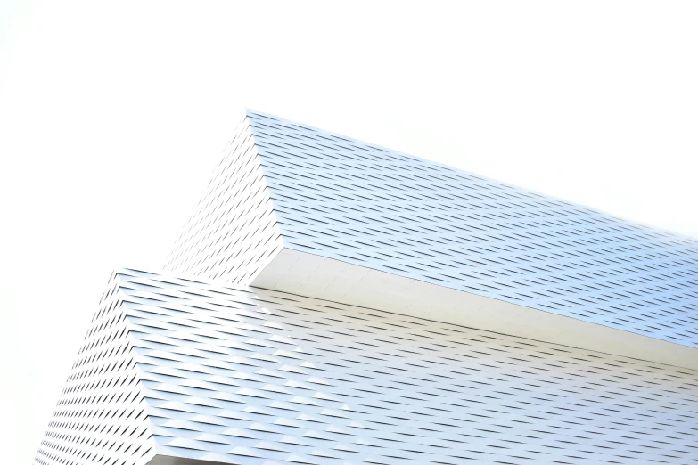 a man riding a skateboard up the side of a building, an abstract sculpture, inspired by Ryoji Ikeda, trending on pexels, minimalism, white polygonal dress, perforated metal, super detailed image, galvalume metal roofing