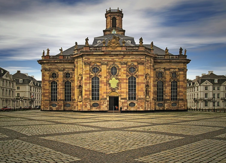 a large building with a clock tower on top of it, by Juergen von Huendeberg, pexels contest winner, baroque, square, smithsonian, “ golden chalice, high definition photo