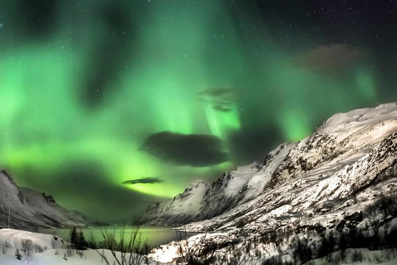 a mountain covered in snow and green lights, by Julia Pishtar, pexels contest winner, norse inspired, grey, highly colorful, nordic