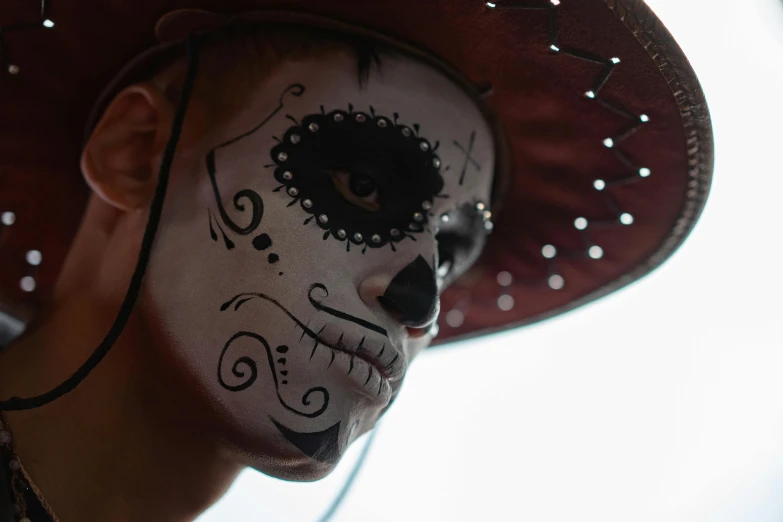 a close up of a person wearing a hat, pexels contest winner, lowbrow, day of all the dead, white face paint, square, avatar image