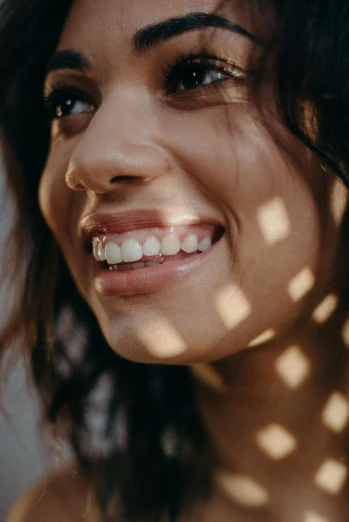 a close up of a woman with a smile on her face, hinged jaw, backlighted, woman is curved, teeth gritted
