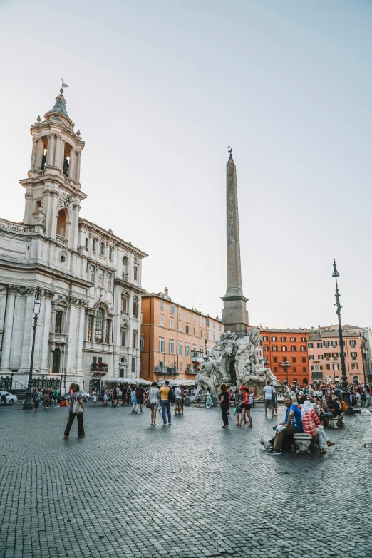 a crowd of people walking around a city square, unsplash contest winner, neoclassicism, bernini, tall stone spires, drinking, 🚿🗝📝