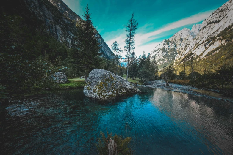 a mountain river in the middle of a forest, a picture, by Sebastian Spreng, unsplash contest winner, crystal clear blue water, southern european scenery, mountains in the background, ponds of water