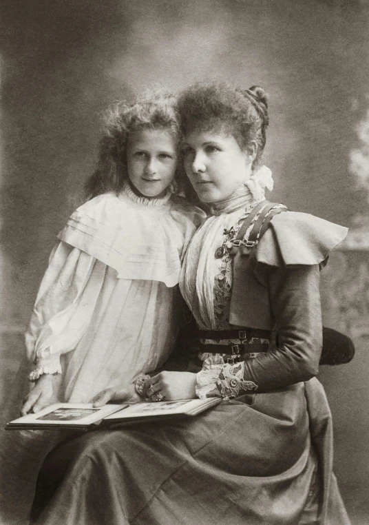 a couple of women sitting next to each other, a black and white photo, art nouveau, with a kid, square, high quality image, queen