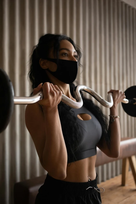 a woman wearing a face mask lifts a barbell, by Sam Black, renaissance, contour, ashteroth, wearing bandit mask, hgh