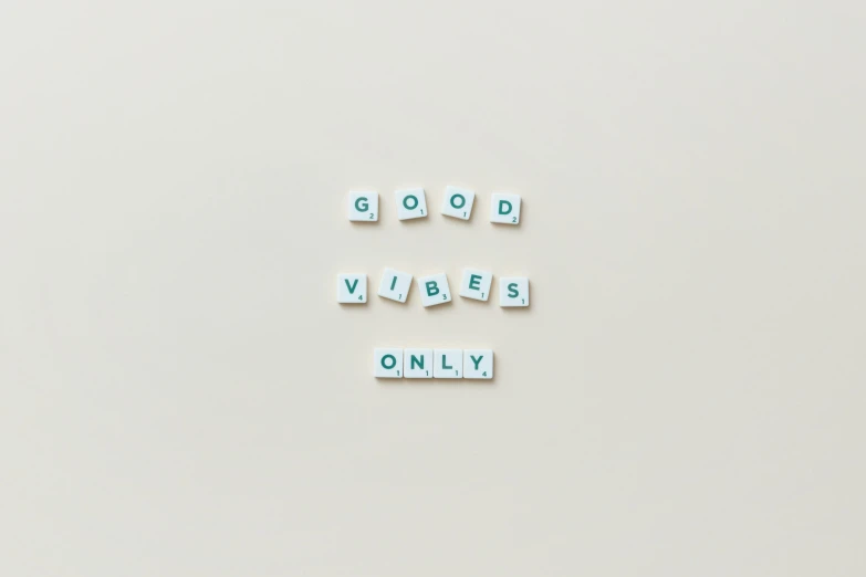 the words good vibes only spelled in scrabbles on a white surface, a picture, by Emma Andijewska, trending on pexels, visual art, corporate animation style, 27, minimalist svg, set pieces