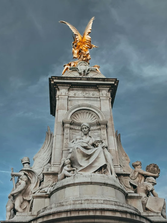 a statue of an angel on top of a building, queen victoria, architecture and more, thumbnail, glorious lighting