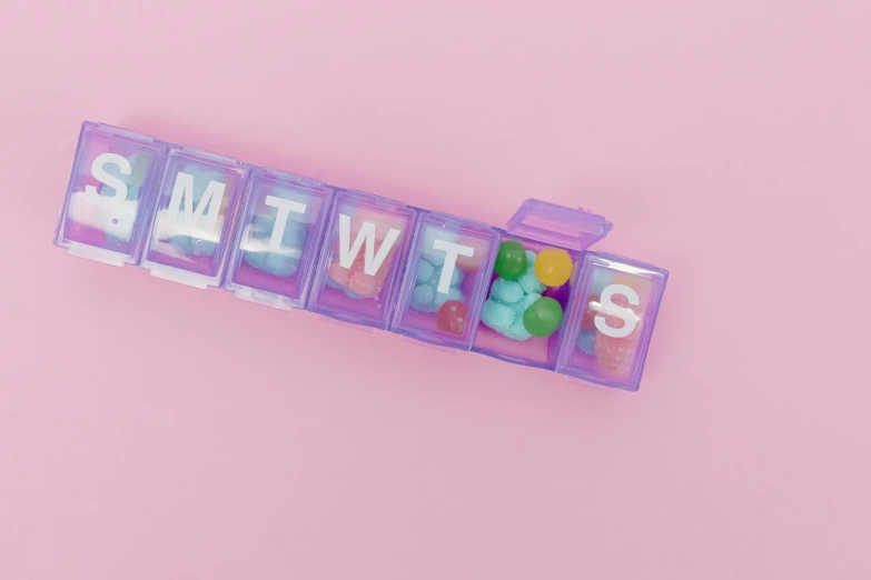 a picture of some type of type of type of type of type of type of type of type of type of type of type of type of, inspired by Damien Hirst, trending on pexels, mingei, pills, purple and pink, product view, mimic. random position content