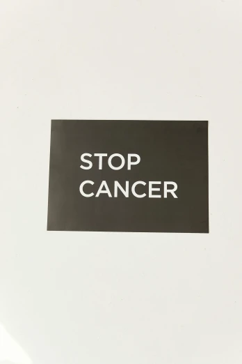 a black and white sign that says stop cancer, by Caro Niederer, 1 / 8 0 s, brown, julia hetta, 256x256