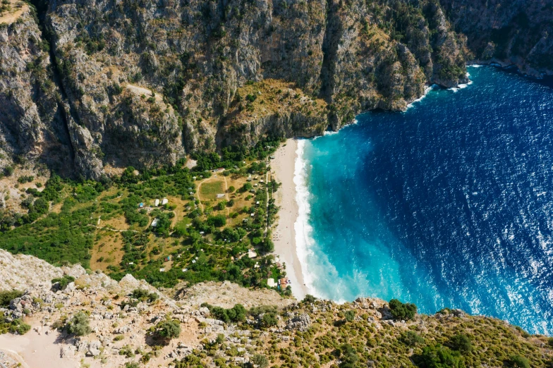 a view of a beach from the top of a mountain, by Daniel Lieske, pexels contest winner, hurufiyya, turkey, avatar image, teaser, conde nast traveler photo