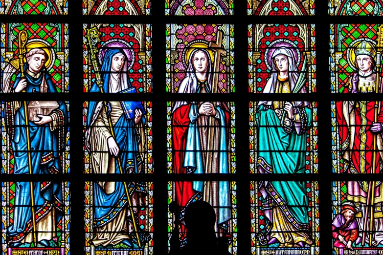 a person standing in front of a stained glass window, three women, majestic saint woman, wikimedia commons, details and vivid colors