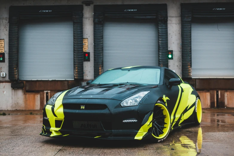 a black and yellow sports car parked in front of a building, by An Gyeon, pexels contest winner, toyism, full body shot 4k, gtr xu1, samurai vinyl wrap, 9 9 designs