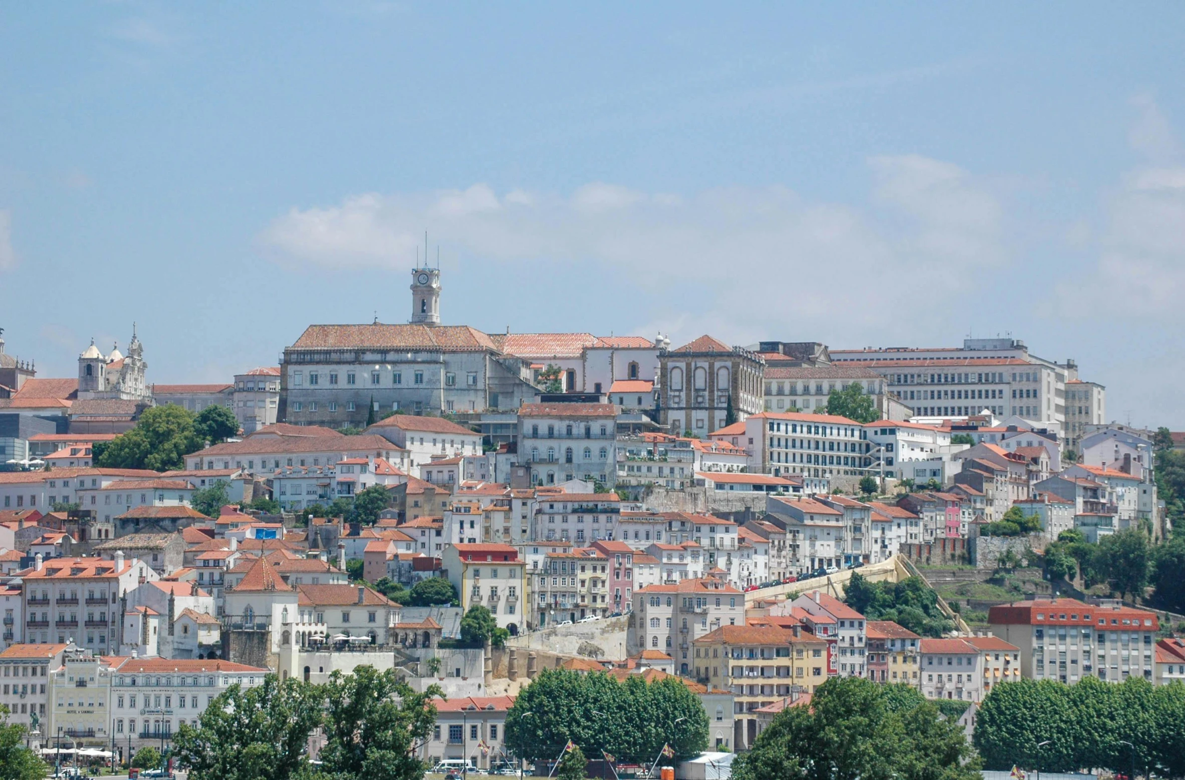 a large group of buildings sitting on top of a hill, pexels contest winner, renaissance, portugal, herzog de meuron, paisley, profile image