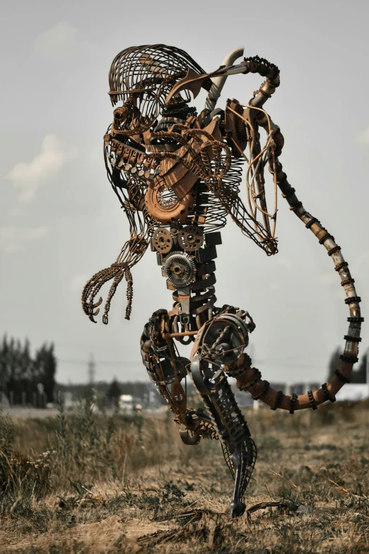 a metal sculpture in the middle of a field, a surrealist sculpture, by Slava Raškaj, unsplash, fashionable cyberpunk mechanoid, skeletal with extra fleshy bits, biker, mining scrap metal