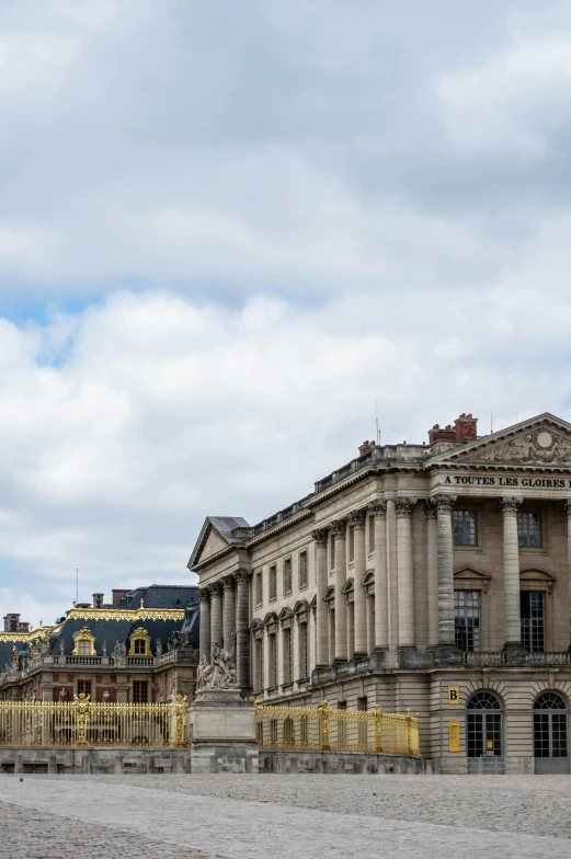 a large building sitting on top of a cobblestone street, inspired by François Girardon, neoclassicism, palace of versailles, 2019 trending photo, 2 5 6 x 2 5 6 pixels, hull