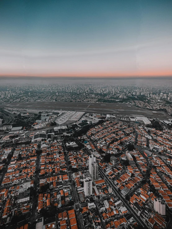 an aerial view of a city at sunset, a colorized photo, pexels contest winner, são paulo, airplane view, eyelevel!!! view!!! photography, transparent background