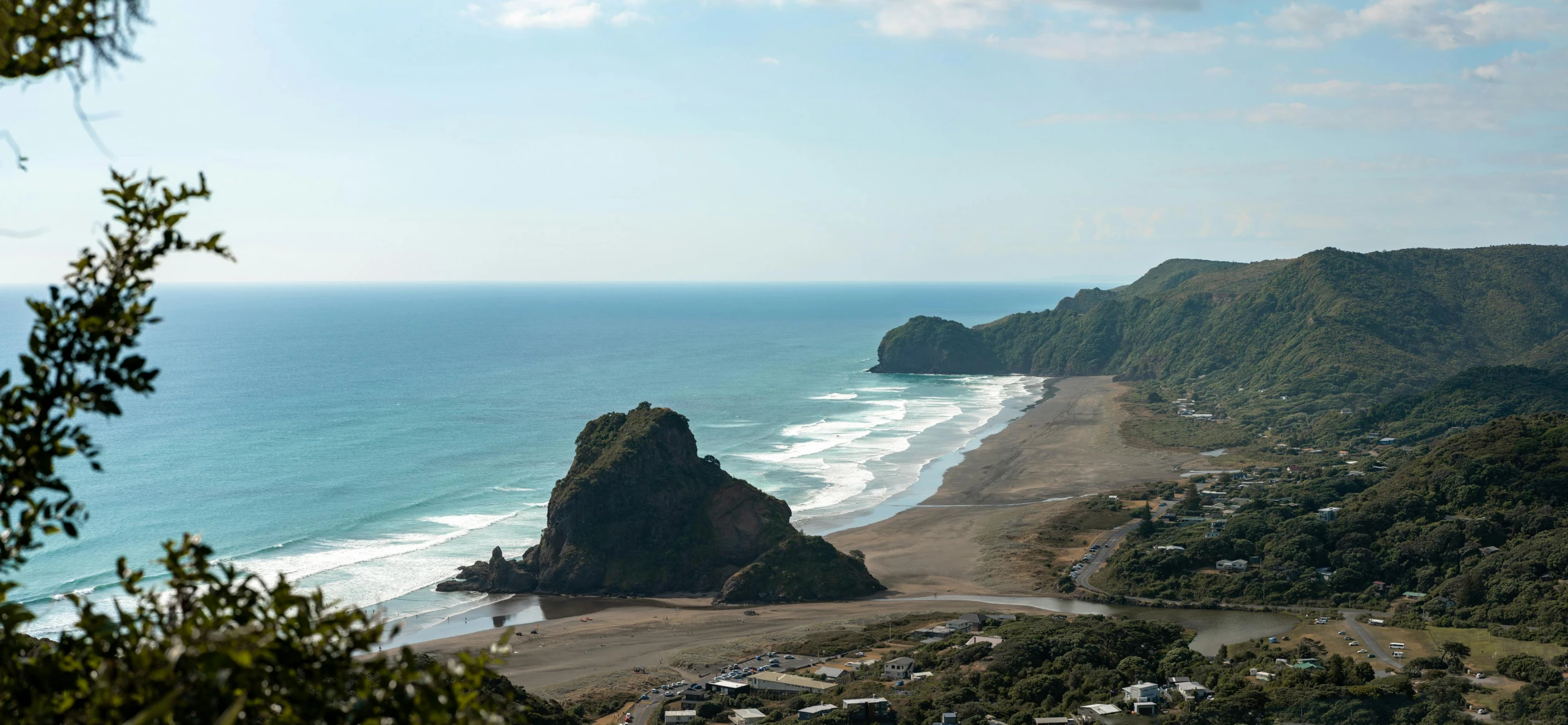 a view of a beach from the top of a hill, by Peter Churcher, pexels contest winner, te pae, dezeen, mountain, recipe