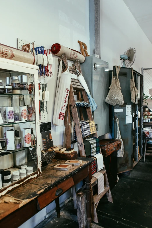 a room filled with lots of assorted items, a silk screen, trending on unsplash, arts and crafts movement, in a butcher shop, “ iron bark, rust and plaster materials, shop front