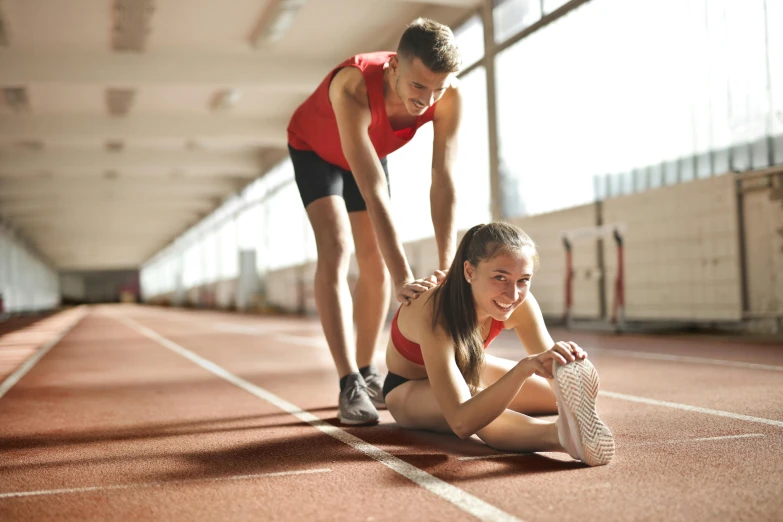 a couple of people that are on a track, pexels contest winner, serving body, profile image, thumbnail, indoor picture