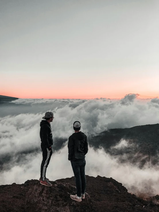 two people standing on top of a mountain, by Niko Henrichon, pexels contest winner, big island, calmly conversing 8k, on clouds, view(full body + zoomed out)