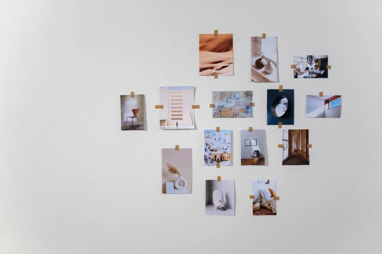 a white refrigerator covered in pictures and magnets, a picture, by Emma Andijewska, trending on pexels, visual art, light - brown wall, cards, minimalist rule of thirds, montage