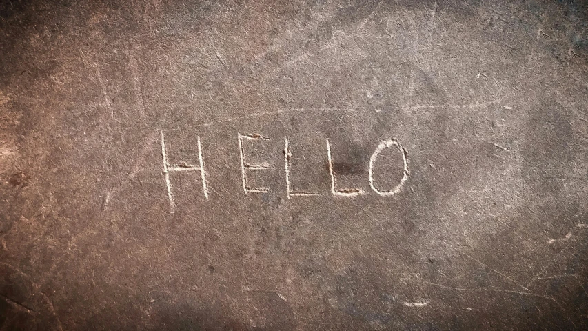 the word hello is written on a dirty surface, inspired by Ian Hamilton Finlay, trending on pixabay, concrete art, agostino arrivabene, smile, 🎨🖌, slate