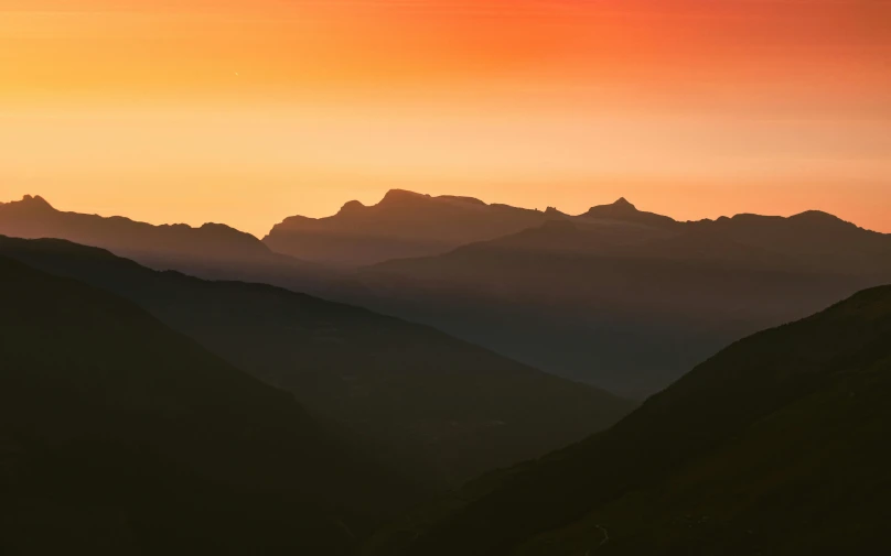 the sun is setting over a mountain range, by Peter Churcher, pexels contest winner, les nabis, orange gradient, fine art print, alpes, brown