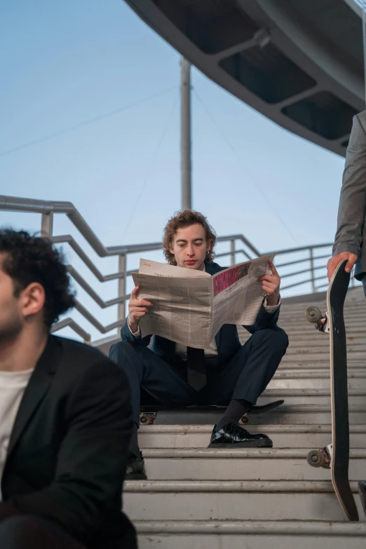 a man riding a skateboard down a flight of stairs, pexels contest winner, happening, man reading newspaper in a bar, timothee chalamet, 3 actors on stage, business men