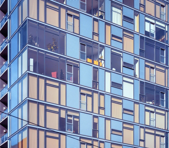 a very tall building with lots of windows, a digital rendering, flickr, bauhaus, blue shutters on windows, archival pigment print, seattle, prize winning color photo